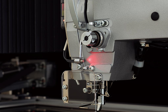 Detects kind of needle thread breakage opportunity immediately, and which reduces defective workpieces.